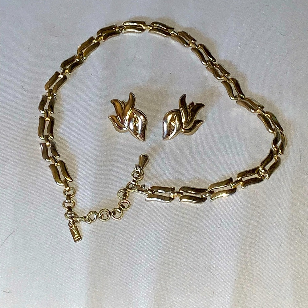 Vintage Monet choker, chain, and earrings. The earrings are clip on
